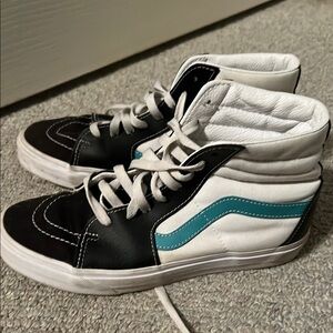 Vans Black and White High-Top Sneakers with Blue Stripe